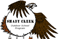 Shady Creek Outdoor School Program banner being encompassed by a Hawk's wing